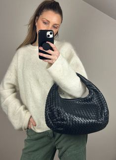 Bottega Veneta's Intrecciato leather hobo bag is the ultimate chic shoulder bag. This one is beautifully made from black leather with gunmetal hardware. When translated to English, intrecciato literally means braided. Bottega Veneta's staple technique involves strips of leather that are intertwined to create a woven pattern, which has become synonymous with the brand. Intrecciato Weave was introduced in the early 1970s and was first used on the brand's handbags. Bottega sell this bag new for £4660. Height: 24cm Width: 40cm Depth: 12cm This bag is in beautiful condition and comes with the original Bottega dust bag. To ensure you’re completely satisfied with your purchase, please refer to the images for the exact condition of the item. Bottega Veneta Hobo Bag, Bottega Bag, Balenciaga Backpack, Gunmetal Hardware, Bottega Veneta Intrecciato, Hobo Shoulder Bag, Woven Pattern, Louis Vuitton Shoulder Bag, Leather Hobo Bag