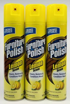 three lemon scent furniture polish sprays on a white background