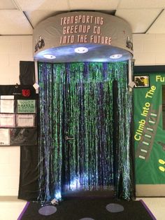 an indoor shower in the middle of a room with green and blue curtains on it