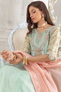 Flora Pista Green Embellished Bollywood Kurta, Embellished Anarkali Salwar Kameez In Pista Green, Pista Green Embellished Kurta For Festive Occasions, Eid Embellished Pista Green Kurta, Embellished Pista Green Anarkali Salwar Kameez, Embellished Pista Green Anarkali Set For Eid, Festive Embellished Pista Green Kurta, Pista Green Embellished Kurta For Wedding, Elegant Pista Green Churidar With Traditional Drape