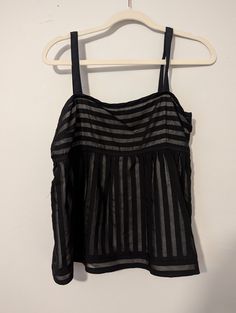 Adorable! Excellent. Used condition black and gray medium blouse  Ax2 Bd2 Black Summer Vest Top, Black Vest Top For Summer, Casual Black Sleeveless Blouse, Black Sleeveless Vest Top, Black Cami Top For Spring, Black Summer Cami Blouse, Black Vest Tank Blouse, Black Tank Vest Blouse, Black Tank Blouse With Vest Detail