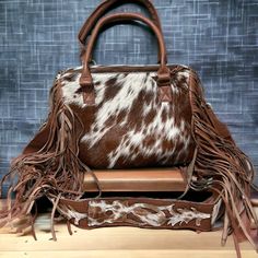 Fringe-Adorned Cowhide Bag with Crossbody Strap and Tote Handle - Rodeo Cowhide RugsBrown Cowhide Pattern, Eco Friendly Shopping Bags, Cowhide Bag, Cup Sleeve, Classic Brown, Cow Hide Rug, Soft Bristle Brush, Go Green, Crossbody Strap