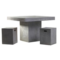 a concrete table and two stools on a white background