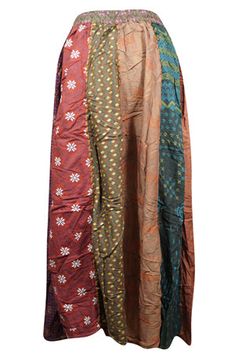 Handmade Womens Maxi Fall Skirt, Handmade Long Patchwork Retro Flared Skirts S/M/L adorned with an array of eclectic prints, including abstract, solid, striped, and floral motifs, all beautifully presented on a soft, breathable rayon fabric. This skirt exudes charm and versatility.These vertical panels are adorned with a thick "dori," extending from the waist down to the hem, resulting in a festive boho aesthetic.This long skirt features a accordion pleat design that commences with a narrower wa Red Patchwork Skirt For Spring, Spring Red Patchwork Skirt, Multicolor Harem Skirt, Bohemian Red Skirt With Patchwork, Relaxed Multicolor Patchwork Skirt, Multicolor Patchwork Skirt, Multicolor Patchwork Flowy Skirt, Red Long Hippie Skirt, Eclectic Prints