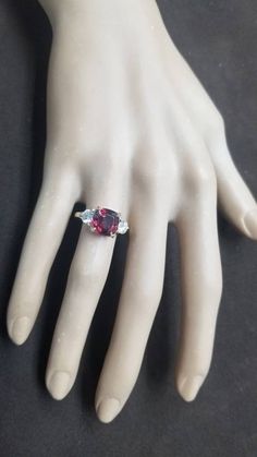 GORGEOUS 14K yellow gold engagement ring natural red garnet in cushion shape center natural garnet weight 3.52ct. size 9x9mm very nice rich red color nice luster, very lively ,nice cut.clean brilliant stone. side two round cut diamonds total weight 0.82ct. G-SI2 Size 4.8mm ring size 6 Resizable Appraisal available Retail value $8,500 net. Cushion Cut Ruby Ring Gift, Cushion Cut Ruby Ring As A Gift, Red Cushion Cut Center Stone Jewelry, Red Cushion Cut Gemstone Jewelry, Red Cushion Cut Ring With Accent Stones, Elegant Red Cushion Cut Ruby Ring, Red Cushion Cut Ruby Jewelry, Emerald Ring Vintage, Filigree Engagement Ring