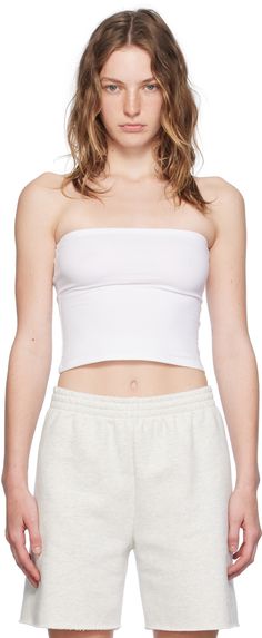 Stretch cotton jersey tube top. · Straight neck · Converts to skirt Supplier color: White Versatile Cotton Tube Top For Spring, Versatile Strapless Tube Top For Spring, Strapless Cotton Tube Top For Spring, Versatile Stretch Tube Top For Spring, Sleeveless Cotton Tube Top, Versatile Stretch Cotton Crop Top, Fitted Cotton Tube Top For Spring, Versatile Fitted Bandeau Tank Top, Solid Color Elastane Tube Top