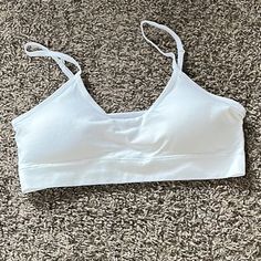 Brand New White Sports Bra With Very Light Padding. Comfortable Fitted White Activewear, Casual Stretch Cotton Sports Bra, Casual Cotton Stretch Sports Bra, Casual Cotton Sports Bra, Cotton Sports Bra For Workout In Spring, Spring Cotton Sports Bra For Workout, Spring Workout Cotton Sports Bra, Spring Cotton Sports Bra With Built-in Bra, White Sports Bra With Light Support For Spring