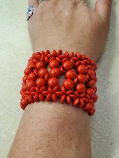 Metal Free, Candy Apple Red, Wooden Beaded Bracelet, Expandable Bracelet, Costume Jewelry, Fashion Accessory This is a great little find and priced to sell.  This is 2 inches in diameter and does expand to 4 inches.  Total length is 8 inches long if laid flat and cut in half.  This is 2.40 inches wide. Check out our shop for monthly specials. We have a variety of items for every taste. Combine several of our items together to save on shipping. If you have any questions, please do not hesitate to Red Beaded Bangle Bracelets, Red Wooden Beads Bracelets As Gift, Red Beaded Bangle Bracelet, Adjustable Red Beaded Bracelets With Wooden Beads, Unique Hand-strung Red Beaded Bracelets, Unique Red Beaded Bangle Bracelet, Red Wooden Bead Bracelets, Red Wooden Round Bead Bracelets, Red Stretch Bangle Bracelet With Colorful Beads