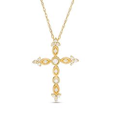 A vintage-inspired look of faith, this diamond cross pendant is a beautiful choice. Fashioned in warm 10K gold, this ornate style showcases bezel-set diamonds and single diamonds in marquise-shaped frames along a cross-shaped design. Trios of diamonds punctuate each of the edges while intricate milgrain detailing lends heirloom appeal. Captivating with 1/8 ct. t.w. of diamonds and a bright polished shine, this pendant suspends along an 18.0-inch rope chain that secures with a spring-ring clasp. Luxury Diamond-cut Cross Necklace As Gift, Catholic Dimond Cross Woman Necklace, Diamond Pendent, Necklace Clasps, Diamond Cross Pendants, Bezel Set Diamond, Diamond Cross, Cross Jewelry, Vintage Diamond