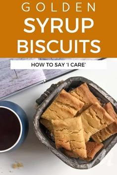 golden syrup biscuits in a basket next to a cup of coffee on a white table