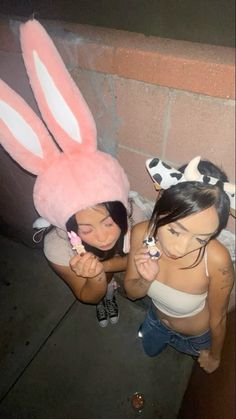 two girls with bunny ears on their heads