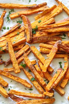 baked sweet potato fries with parsley on top