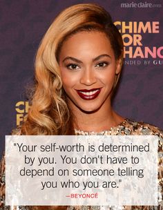 a woman with long blonde hair smiling and holding a sign that says, your self worth is determined by you you don't have to spend on someone telling you who you are