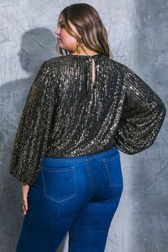 A sequin top featuring round neckline, long sleeve, elasticized waist and back neck button closure. Perfect for my plus size girly wanting a trendy options . Stretch Long Sleeve Crew Neck Top For Party, Fall Party Long Sleeve Crew Neck Top, Trendy Long Sleeve Top For Fall Party, Fall Contrast Sequin Crew Neck Top, Fall Crew Neck Top With Contrast Sequin, Long Sleeve Tops With Contrast Sequin For Night Out, Contrast Sequin Long Sleeve Tops For Night Out, Trendy Sequined Blouse For Party Season, Trendy Long Sleeve Party Tops