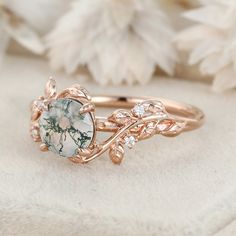 Step into elegance in nature with our Leaf Inspired Round Cut Green Moss Agate Engagement Ring, beautifully crafted in 14K rose gold. Its timeless beauty makes it a perfect symbol of your love. Leafy Wedding Ring, Nature-inspired Rose Gold Gemstone Rings, Nature-inspired Rose Gold Gemstone Jewelry, Whimsical Wedding Ring, Whimsical Ring, Diamond Leaf Ring, Radiant Cut Rings, Ashes Ring, Vine Ring