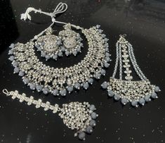 F A R A H  Stunning Grey Silver Crystal Necklace Set includes Jhumkey Earrings, Tikka and Jhumer  Antique Silver Finishing  Stunning Set perfect for any Wedding, Party Function Silver Bridal Sets For Diwali Celebration, Adjustable Festive Jewelry Sets For Weddings, Adjustable Jewelry Sets For Wedding And Festivals, Silver Bridal Sets For Diwali, Bollywood Silver Bridal Sets For Celebration, Bollywood Style Silver Bridal Sets For Celebration, Traditional Silver Bridal Sets For Party, Silver Bridal Sets For Festivals, Silver Jewelry Set For Wedding And Festivals