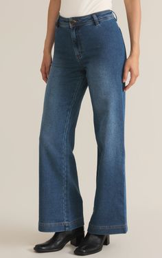 We're excited to debut this chic mid-rise wide leg trouser, crafted from premium heavyweight denim for a sophisticated look and durable feel. With patch pockets at the back, a structured waistband, and wide hem detail, these full-length trousers offer timeless style. High rise Full length Zip fly with button closure Back Pockets Midweight Wide leg Knit Denim: 92% Cotton, 7% Polyester, 1% Spandex Vintage Indigo Relaxed Fit High-waisted Denim Wide Leg Pants, Medium Wash Wide-leg Bottoms With Contrast Stitching, Everyday Wide-leg Rigid Denim Pants, Non-stretch Denim Wide Leg Pants With Pockets, Denim Blue Pull-on Wide Leg Bottoms, Knit Denim, Satin Midi Skirt, Vintage Indigo, Straight Leg Denim