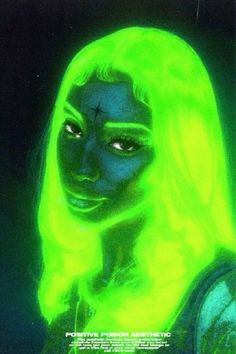 a woman with neon green hair and makeup