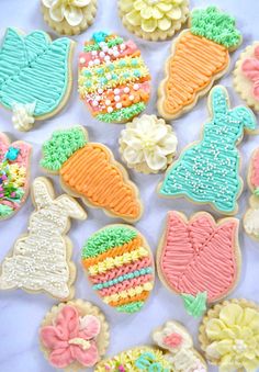 some decorated sugar cookies with the words buttercream sugar cookies