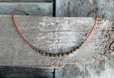 ✦Delicate and eye catching, gorgeous Czech glass matte beads in opaque various autumn tones, single short strand necklace. The 15 main beads are capped and separated with tiny 2mm brass round beads and tiny terracotta seed beads at back of necklace, finished with clasp and extension chain. This necklace is a delight. ✦Bead size vary from 7mm to 6mm. Seed beads at back 2mm. ✦Length of necklace 42cm (161/2") approximately, plus a 6cm (2 1/2") extension chain. ✦ Also there is a matching earrings op Bohemian Everyday Necklaces With Spacer Beads, Czech Glass Necklace, Autumn Tones, Earth Mother, Mother Necklace, Hippie Necklace, Mothers Necklace, Necklace Simple, Bohemian Necklace