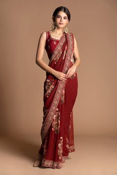 Red pre-stitched saree with multi-color floral motif embroidery. Comes with sleeveless blouse. Component: 2 Embroidered Neckline: U Neck Sleeve Length: Sleeveless Fabric: Viscose Georgette Color: Red, Maroon Pre-draped saree - Aza Fashions Sari India, Lehenga Inspiration, Drape Saree, Blue Saree