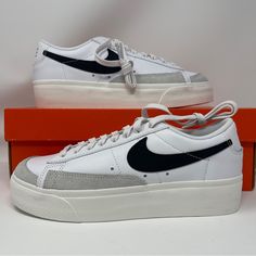 Elevate Your Sneaker Game With These Nike W Blazer Low Platform Sneakers In White, Black, Sail, And Orange. The Shoes Feature A Low Top Shoe Shaft Style With A Lace-Up Closure And Are Made With High-Quality Leather For A Comfortable Fit. The Nike Blazer Low Platform Model Is Perfect For Athletic Wear And Casual Occasions. These Sneakers Come In A Uk Size 6 And A Us Size 8 With A Standard Shoe Width. The Shoes Are Designed With A 70s And 80s Retro Theme, Making Them Perfect For Athleisure Fashion. The Sneaker's Features Include A Cushioned Sole, Limited Edition Design, And Adjustable Fit. Ideal For Walking, School, And Basketball Activities, These Nike Blazer Low Platform Sneakers Are A Mus Basketball Activities, Orange Sneakers, Blazer Low, Retro Theme, Sneaker Games, Athleisure Fashion, Nike Blazer, 80s Retro, Slipper Boots