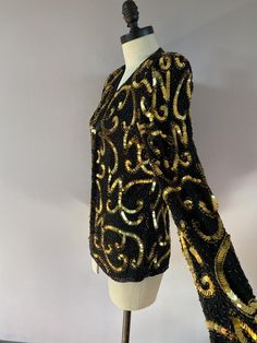 Vintage handmade sequined evening jacket by Stenay. Made in India. 100% silk. Size S. Excellent condition. There are hidden hooks all the way down the front to wear it closed. Silk Sequined Long Sleeve Outerwear, Silk Winter Party Outerwear, Silk Outerwear For Fall Parties, Silk Outerwear For Party In Winter, Silk Party Outerwear For Fall, Evening Jacket, Victorian Lady, Evening Jackets, Way Down