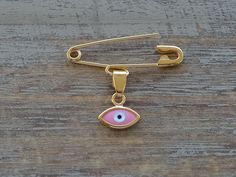 This is a Gold Evil Eye Safety Pin Brooch which is 2.5 cm long and the weight is 0.9 gr. I hallmark all the items. Here is some details of the item: Gold-Glossy finish-Hand made-Hallmarked. The Gold Evil Eye Safety Pin Brooch is shipped in a really nice gift box. Here is some general information about gold carat: There are several carats available for gold. The carat is the gold content of the metal. The carat measures the proportion of pure gold mixed with other metal alloy to make up the final Gold Safety Pin Lapel Pin Gift, Gold Safety Pin Lapel Pin For Gift, Baby Baptism Gifts, Grandma To Be, Eye Safety, Safety Pin Brooch, Unisex Earrings, Punk Earrings, Safety Pin Earrings