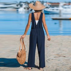 Indulge in sleek simplicity with our Navy Square Neck Straight Leg Jumpsuit. Designed with a square neckline and straight leg silhouette, this jumpsuit offers timeless style. Product code: CAA13E4B018JJ,CAA13E4B018PP Beach Overalls And Rompers In Solid Color, Chic Navy Sleeveless Jumpsuits And Rompers, Navy Summer Overall Jumpsuit, Chic Navy Jumpsuits And Rompers For Summer, Navy Jumpsuits And Rompers For Work In Summer, Baggy Jumpsuit, Cargo Jumpsuit, Peasant Sleeve, Boiler Suit