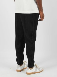 HOMME PLISSE` ISSEY MIYAKE Mc August trousers, in pleated fabric. - FW24 - Regular and straight fit - Tapered model - Elasticated waist with internal drawstring - Belt loops - Internal drawstring - Side welt pockets - Made in Philippines - 100% Polyester Homme Plisse Issey Miyake, Herno Jacket, Expensive Handbags, Margiela Shoes, New Bottega, John Lobb, Gucci Sneakers, Pleated Fabric, Issey Miyake