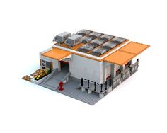 a lego model of a building with an orange roof