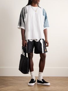 KAPITAL’s T-shirt is printed with the label's signature bandanas to look as if they’re draped over your shoulders. It's been made in Japan from cotton-jersey and cut for an oversized fit. Wardrobe Edit, Luxury Sneakers, Bandana Print, Loungewear Shorts, Short Suit, Suede Jacket, T Shirt For Men, Mr Porter, Bandanas