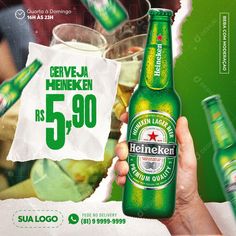 the advertisement for heineken beer is being held up by someone's hand