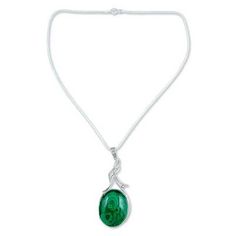 Nestled in an argent cradle malachite emits a rich green glow. This lyrical design comes from Alok Jain who creates it in sterling silver. The necklace is comprised of a pendant and chain. Rhodium-plated. .925 Sterling silver Green Oval Pendant Necklace Spiritual Style, Green Oval Pendant Necklace For Spiritual Style, Spiritual Green Oval Pendant Necklace, Green Oval Malachite Necklaces, Green Oval Malachite Necklace, Moonstone Pendant Necklace, Malachite Necklace, Malachite Pendant, Ruby Pendant