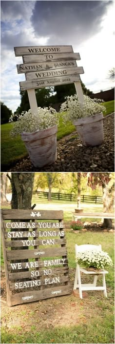 two wooden signs sitting on top of a grass covered field next to a bench with flowers in it