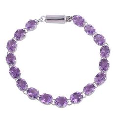 A truly dazzling accessory this tennis-style bracelet is composed of glittering amethysts totaling 25.5 carats. Artisan Alok Jain of India designs the bracelet with rhodium-plated sterling silver accents. Amethyst Tennis Bracelet As A Gift, Purple Gemstone Round Tennis Bracelet, Purple Gemstone Tennis Bracelet, Formal Amethyst Gemstone Tennis Bracelet, Formal Purple Amethyst Tennis Bracelet, Amethyst Gemstone Tennis Bracelet Gift, Amethyst Gemstone Tennis Bracelet, Silver Chandelier Earrings, Silver Chandelier