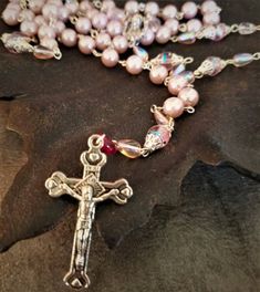 A lovely gift idea for your little ones first holy communion, baptism, confirmation or any special occasion.Measures approximately 24" LNote: Shipping overages over $1 are automatically credited back to your account.All items ship immediately.If you need additional images, info please do not hesitate to contact us. Handmade Pink Spiritual Rosary, Handmade Pink Rosary For Baptism, Handmade Pink Rosary For First Communion, Handmade Pink Rosary In Cross Shape, Handmade Pink Cross Rosary, Handmade Pink Rosary With Cross, Handmade Pink Rosary With Cross Shape, Antique Restoration, Shot Glass Set