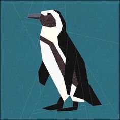 an image of a penguin that is in the process of cut out from pieces of paper