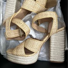 Make A Fabulous Statement By Donning The Gorgeous And Comfortable Design Of The Coach Nelly Raffia Sandals. Measurements: Heel Height: 5 In Weight: 1 Lb 1 Oz Platform Height: 1 12 In Beige Round Toe Heels For Summer, Beige Wedge Sandals With Woven Sole And Open Heel, Beige Platform Sandals With Straw Material, Beige Straw Platform Sandals, Chic Cream Heels In Straw Material, Chic Cream Straw Heels, Beige Straw Wedge Sandals With Open Heel, Open Toe Synthetic Heels In A Neutral Color, Summer Leather Block Heel Shoes