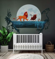 the lion king and the mouse prince wall decals in a baby's room