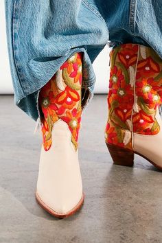 Floral Embroidered Boots For Spring Festival, Floral Embroidery Boots For Spring Festival, Western Boots With Floral Print For Fall, Embroidered Boots For Spring Festivals, Spring Festival Embroidered Boots, Bohemian Boots With Floral Embroidery For Fall, Bohemian Fall Boots With Floral Embroidery, Floral Embroidery Round Toe Boots For Fall, Fall Floral Embroidered Boots With Round Toe