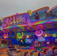 a carnival ride with colorful lights and decorations