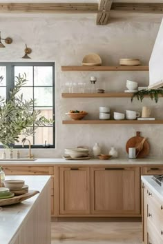 the kitchen is clean and ready to be used for cooking or baking, while also being used as a dining area