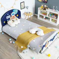 a child's bedroom with toys on the floor