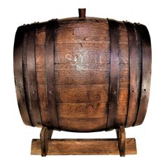 an old wooden barrel is on display against a white background with clipping for text