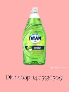 a bottle of dish soap sitting on top of a pink background with the words dawn