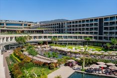 an aerial view of the resort and pool area