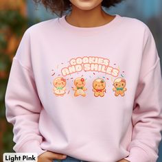 A cute and demure Gingerbread Woman Christmas sweatshirt featuring a happy cartoon smiling cookies sprinkles graphic design. This sweet and girly jumper is the perfect festive and fun gift for foodies and cookie lovers. It exudes a cheerful and whimsical vibe, adding a touch of holiday spirit to the wearer's wardrobe. Ideal for Christmas celebrations and cozy winter days. Product features - Medium-heavy fabric blend of 50% cotton and 50% polyester for coziness in colder months - Classic fit and Cookies Sprinkles, Gingerbread Woman, Gingerbread Lady, Vintage Jumper, Happy Cartoon, Graphic Sweaters, Photo Proof, Foodie Gifts, Winter Days