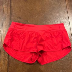 Brand New Lululemon Shorts Red Activewear With Pockets For Workout, Red Athletic Shorts For Yoga, Red Stretch Go-dry Shorts, Red Athleisure Shorts For Beach, Red Athleisure Shorts For The Beach, Red Athletic Shorts With Built-in Shorts For Workout, Red Go-dry Workout Bottoms, Red Workout Bottoms With Built-in Shorts, Red Short Running Bottoms