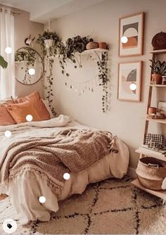 a bedroom with lots of plants hanging on the wall and lights above the bed in front of it